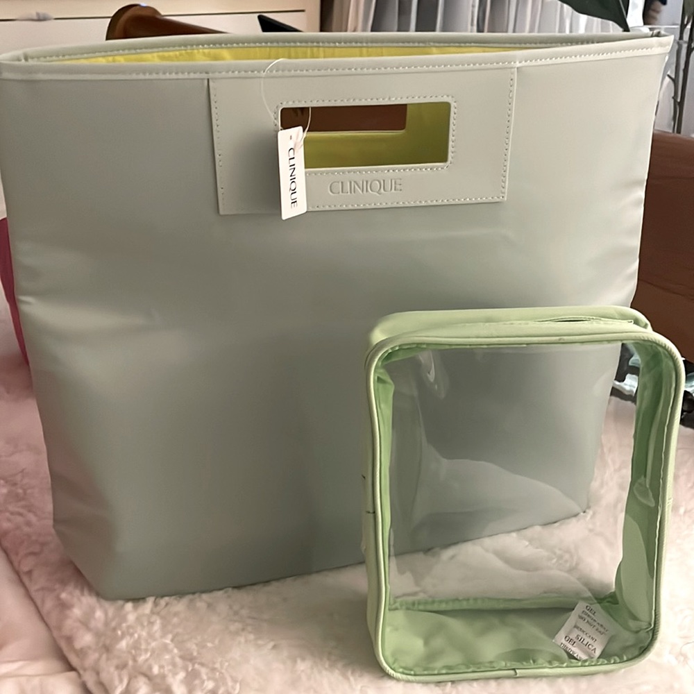 Limited edition Tiffany satin mint handbag with makeup jelly bag by Clinique.